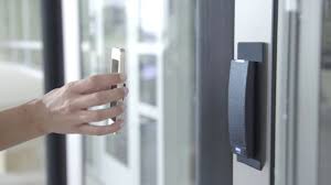 Person using Mobile Credential to Gain Entry Through Door